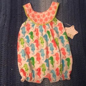 NWT baby girl romper/sun suit.